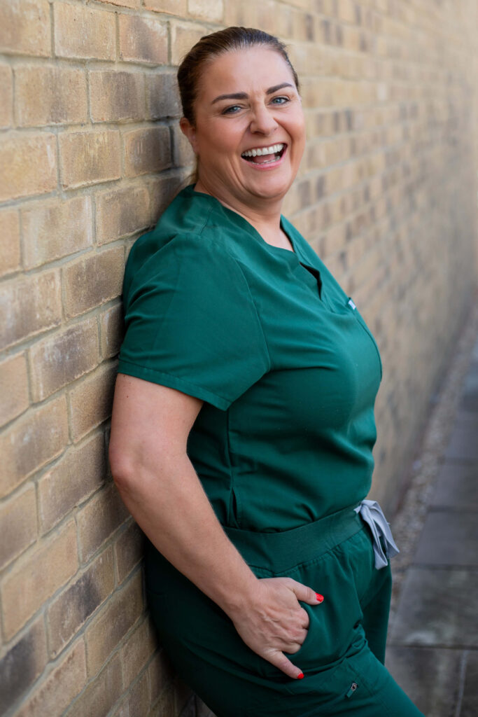 Smiling woman outdoors during a brand shoot