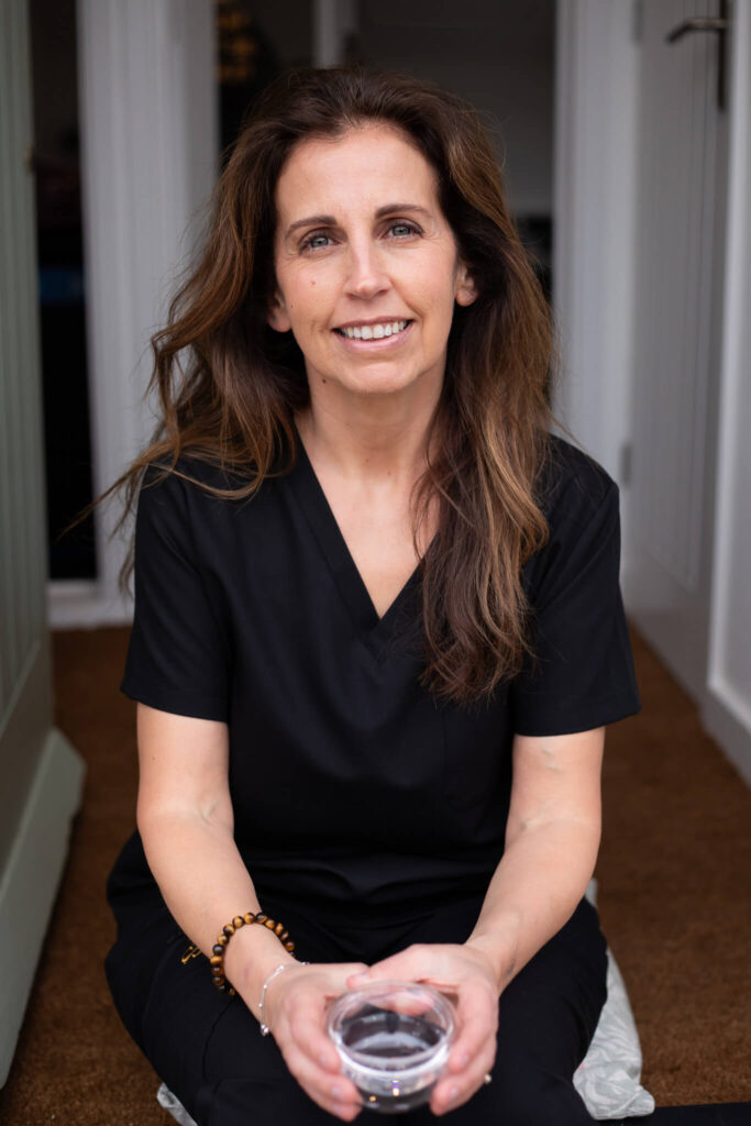 Female entrepreneur sitting outdoors during a photoshoot
