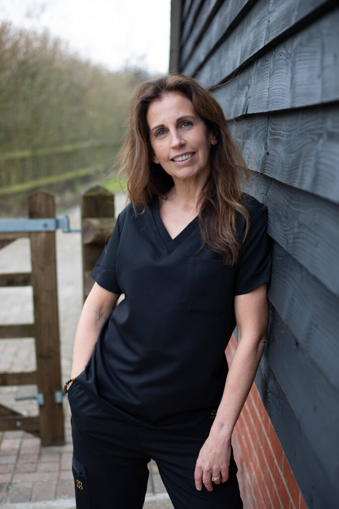 Female business owner standing outdoors during a photoshoot