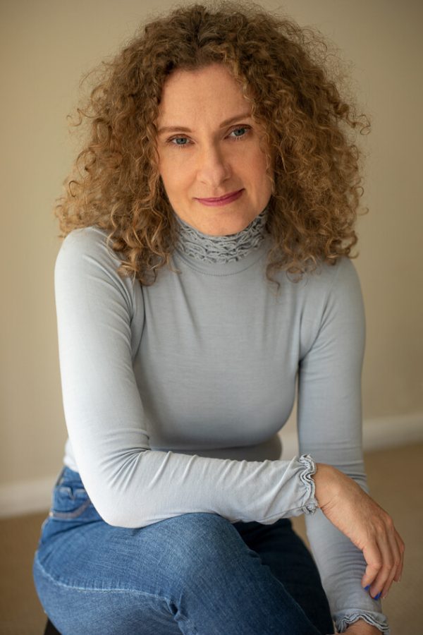 Relaxed portrait of a female business owner indoors